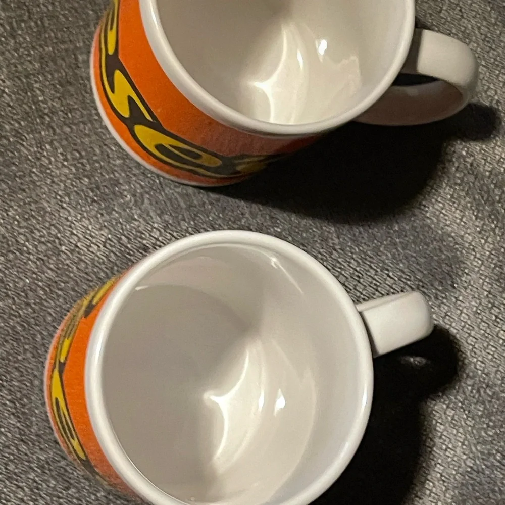 Pair of Reese’s candy mugs.